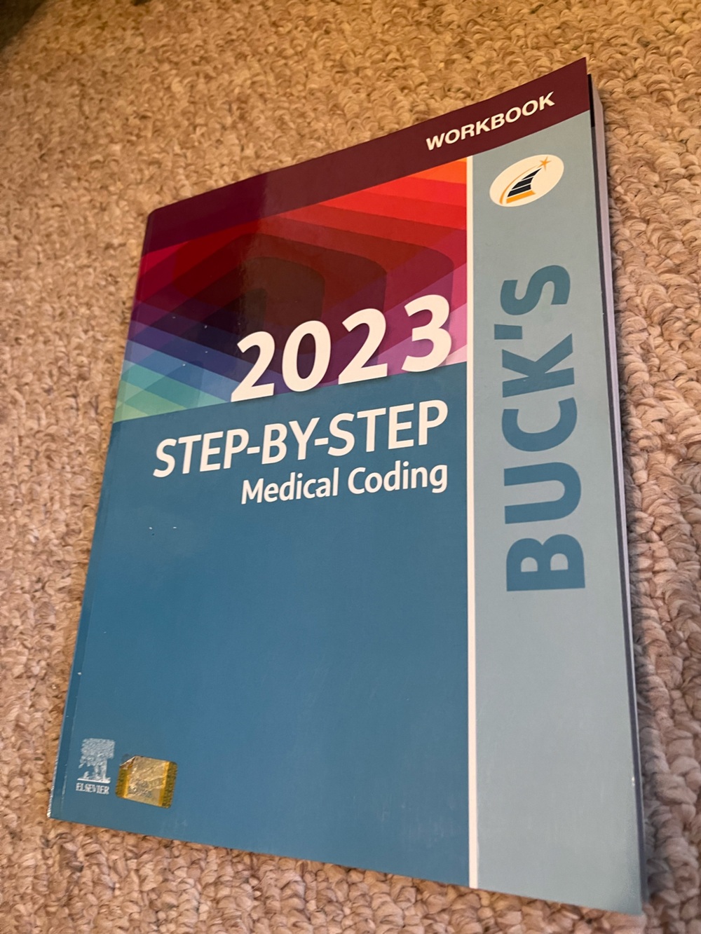 Buck's 2023 Step-by-Step Medical Coding Book - Teal & Multicolor